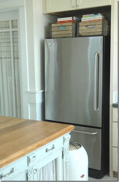 This digital photography of kitchen cabinet above refrigerator ideas has dimension 1080 x 1602 pixels. Baskets or bins above fridge for cookbook storage! (With ...