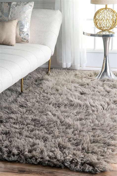 Polypropylene rugs and wool area rugs are extremely durable, easy to clean, and simple to maintain. Premium Greek Flokati Natural Gray Rug | Rugs in living ...