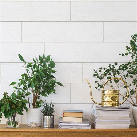 Another great feature about shiplap is that it can be painted. Textured Shiplap Planks White-Washed Peel and Stick ...