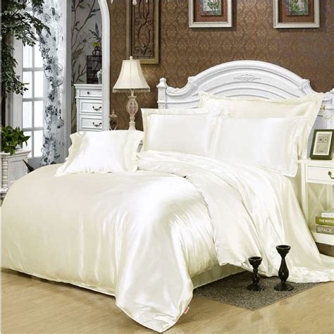 From down to down alternative, this bedding feels. solid white/black/gold/gray satin comforter/duvet cover ...
