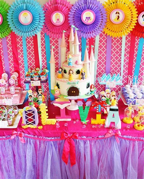 A candy buffet is more than a sweet treat, it's a pop of vibrant color that looks as amazing as it tastes. Colorful Disney Princess Party Ideas // Hostess with the ...