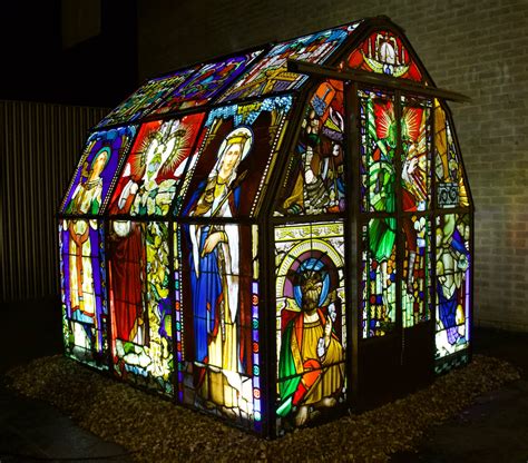 repurposed stained glass comprises a disorienting illuminated greenhouse by heywood and condie