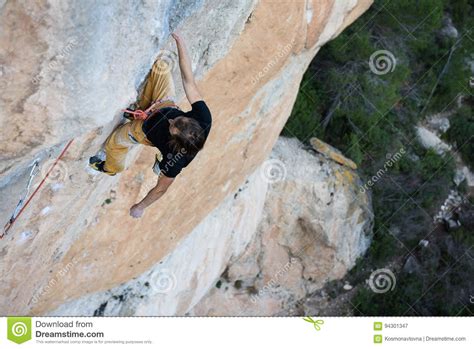Extreme Sport Climbing Rock Climber Struggle For Success Stock Image