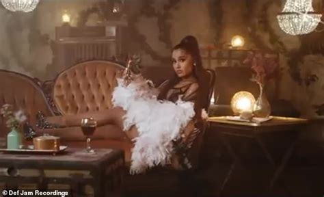 ariana grande transforms into wild west saloon singer in rule the world music video with 2
