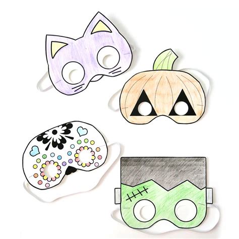 Three Paper Masks With Different Designs On Them One Has A Cat And The