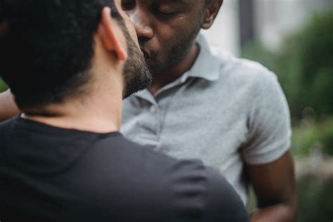 Two Men Kissing · Free Stock Photo