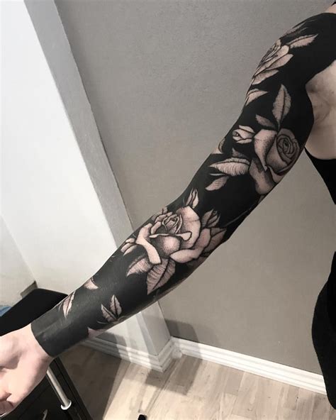Black Art Tattoo Arm