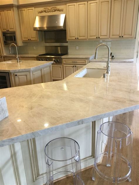 A kitchen backsplash is a design opportunity to use color and pattern, experiment with materials and add a dose of personality to the most frequently used gathering space in the house. My new clean kitchen! Taj Mahal Quartz counters, glass ...