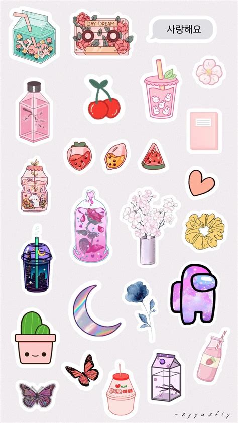 Various Stickers Are Arranged On A White Surface Including Pink And