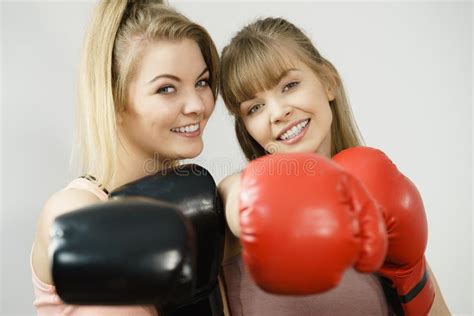 Two Women Friends Wearing Boxing Gloves Stock Photo Image Of Smiling