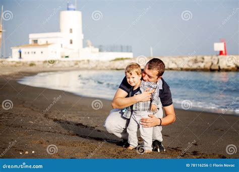 Father And Son Playing On The Beach Stock Photo Image Of Model