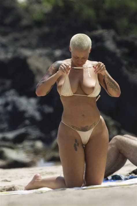amber rose caught topless while sunbathing her huge assets at the beach in maui porn pictures