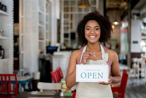 Black Woman Holding Open Sign Asset Funders Network