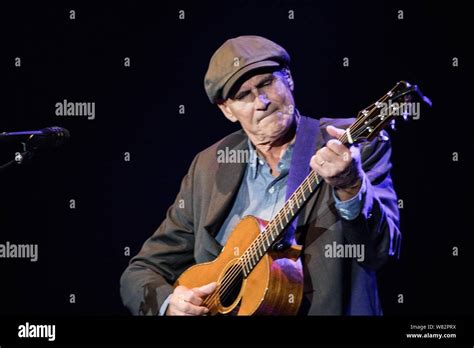 American Singer Songwriter James Taylor Performs During A Concert In