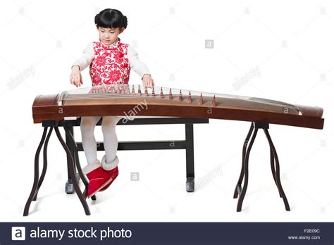 Happy Girl Playing Traditional Chinese Zither Stock Photo Alamy
