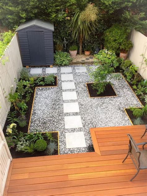 In the visitacion valley neighborhood of san francisco, the garden route co. New Garden design decking seating area leading to granite path with grey and white stones ...