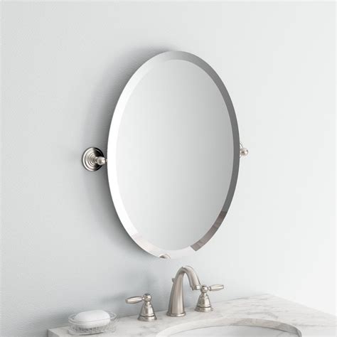 Explore moen's collection of bathroom mirrors available in several designer styles and finishes from modern chrome to transitional polished nickel to traditional oil rubbed bronze. Brushed Nickel Oval Bathroom Mirror 24 in. x 18 in ...