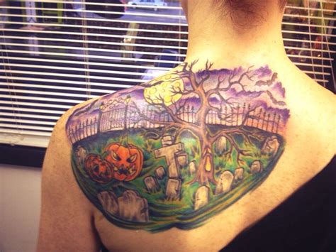 halloween themed graveyard tattoo completed by matt stankis at northside tattoo in wilmington