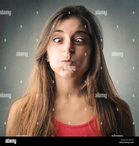Brunette Woman Making Silly Face Stock Photo Alamy