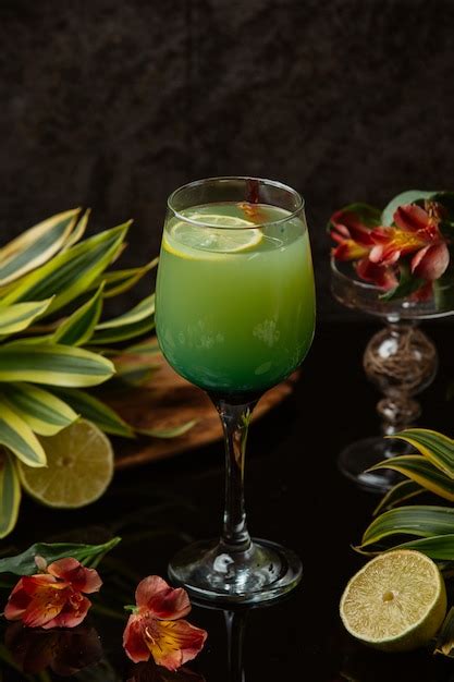 Free Photo A Glass Of Exotic Cocktail With Lemon