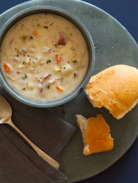Serve clam chowder in bowls with bacon sprinkled on top and red pepper flakes at the table. New England Clam Chowder | Soup recipe | Spoon Fork Bacon
