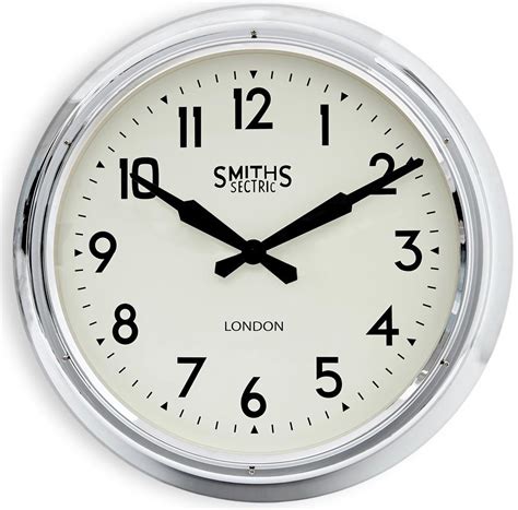 It comes with handy temperature and humidity gauges to keep you updated about the prevailing weather conditions. Extra Large Smiths Wall Clock in Chrome - 60cm