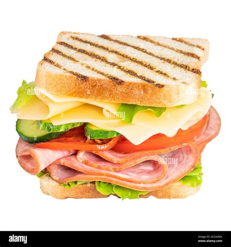 Sandwich With Ham Cheese Tomato Lettuce And Toasted Bread Isolated On A White Background