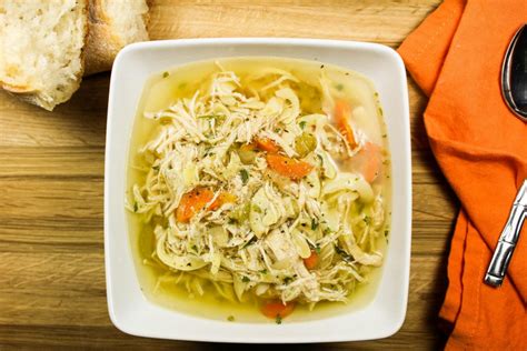 A homemade chicken noodle soup recipe made from scratch using a whole chicken. Slow Cooker Chicken Noodle Soup