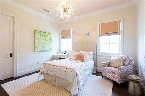 A small simple bed with tall canopy is made as the focal point of the room. Ideas for Decorating a Little Girl's Bedroom