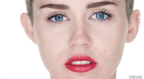 A Cry For Help Miley Cyrus Cries As She Goes Nude In Wrecking Ball