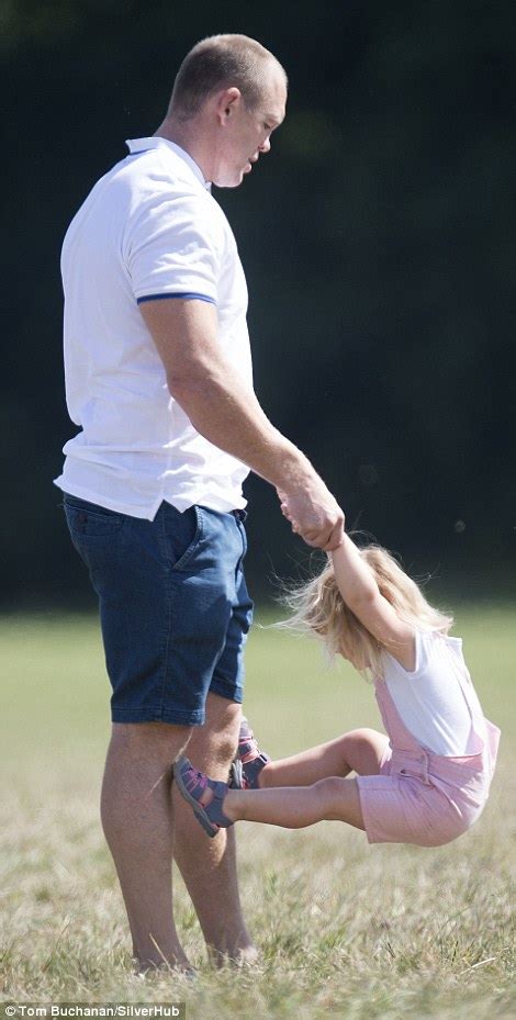 Mike Tindall Grabs Giggling Daughter By The Dungarees In Playful Fight Daily Mail Online