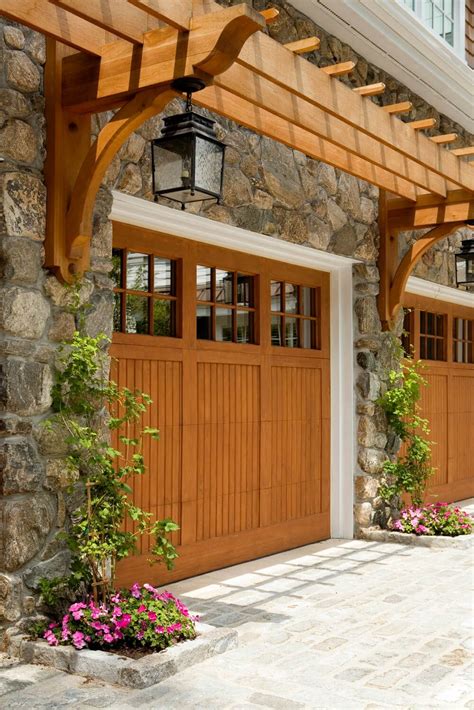 A small pergola set above the garage doors breaks up the tall façade and provides visual interest. 33 Pergola Ideas To Keep Cool This Summer | Door pergola ...