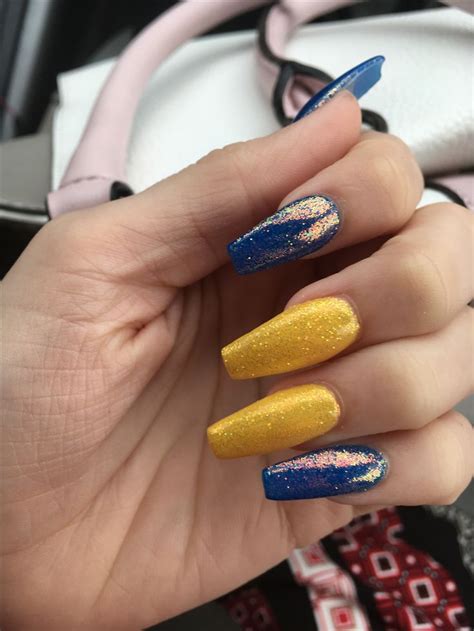 Navy blue and yellow nails. banana yellow & royal blue acrylic nails topped with fairy ...