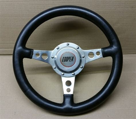 Maybe you would like to learn more about one of these? classic mini steering wheel John Cooper Mota Lita ...