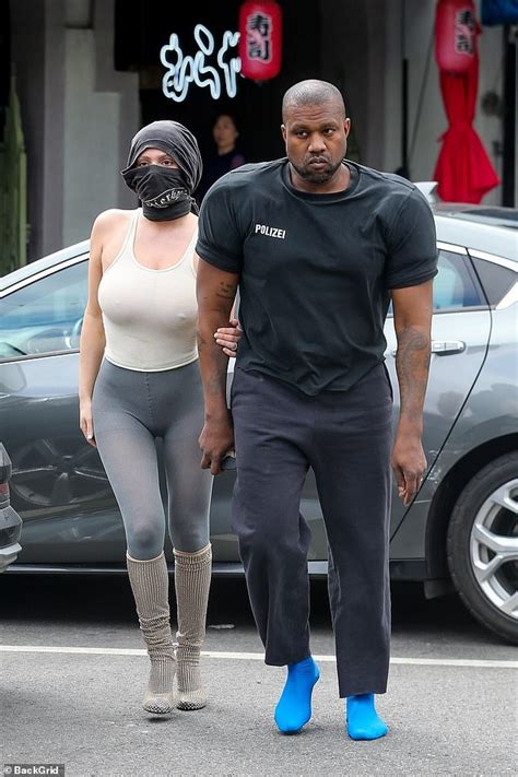 Kanye West Rocks Shoulder Pads And Blue Socks While Out With Wife Bianca Censori Wstpost