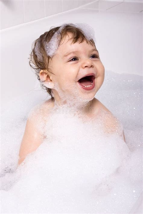 Laughing Baby In Shampoo Delighted Baby Girl Playing In Shampoo Foam
