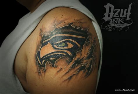 Blue green seattle seahawks tattoo on thigh. Seahawks tattoo | Me, Myself, & I | Pinterest