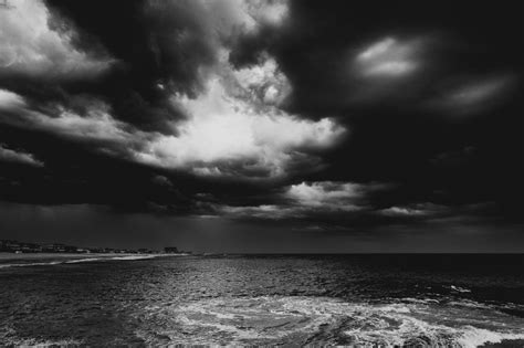 Ocean Storm Clouds Swirling Black Clouds Above Ocean Waves By Randy