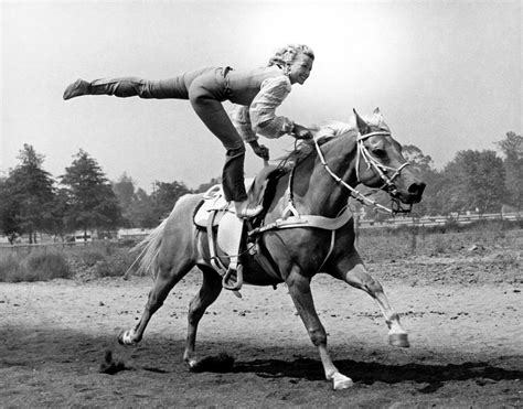 A Trickriding Cowgirl Photograph By Underwood Archives