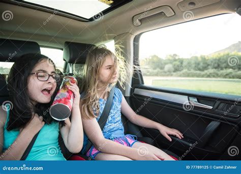 Two Girls Having Fun In A Car Stock Image Image Of Road Happiness 77789125