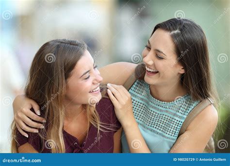 Two Happy Friends Joking On The Street Stock Image Image Of Friends
