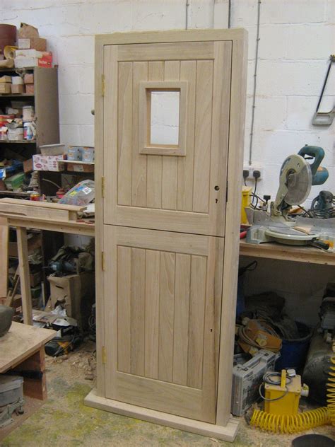 Composite stable doors for houses are perfect for accommodating the needs of busy families. Ledged and braced stable door by Merrin Joinery. www ...