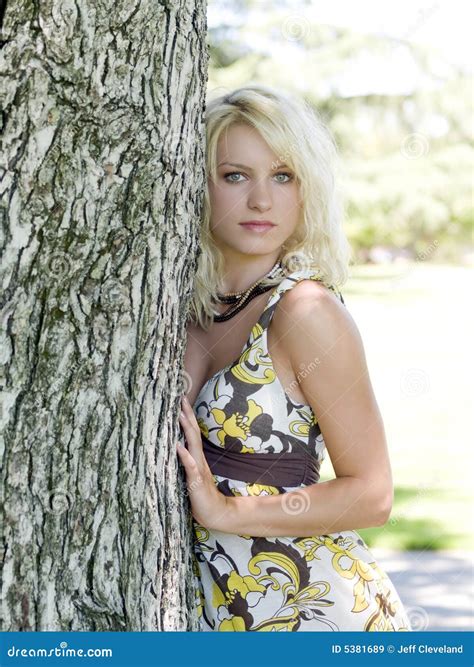 Young Blond Teen Girl Outdoors Next To Tree Royalty Free Stock Images Image 5381689