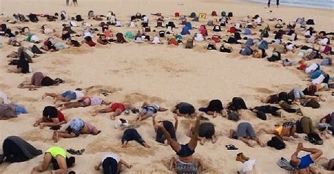 This Head In The Sand Protest At Bondi Is The Best Thing Ever