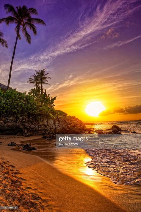A Tropical Beach Sunset On A Beautiful Day High Res Stock