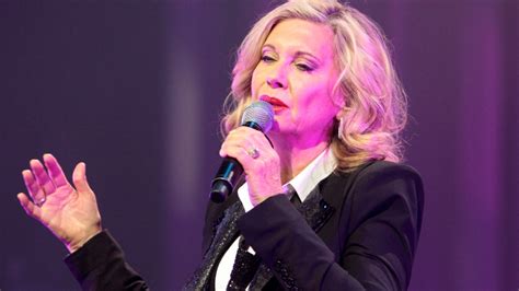 olivia newton john diagnosed with cancer for third time itv news