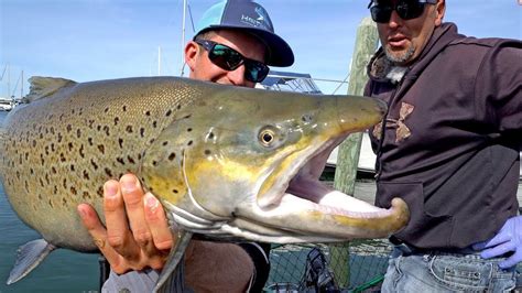 Fishing For Monster Brown Trout By Downtown Milwaukee On Lake Michigan