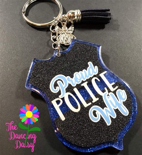 The designs, patterns,accessories and package can be customized.customers can choose a variety of additional processes such as epoxy, holographic, candy keychains, adding sequins and glitter etc. Police badge acrylic keychain | How to make keychains ...