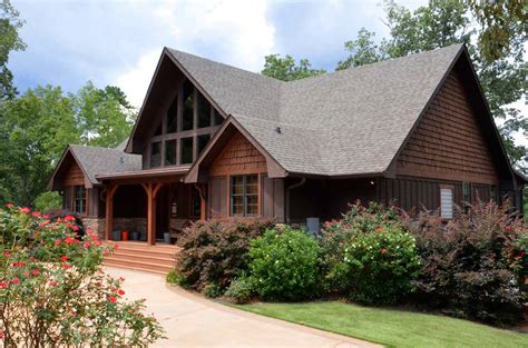 Common features include huge windows and large decks to help take in the views as well. houzz-appalachian-mountain-house-plan-design • View on Flickr