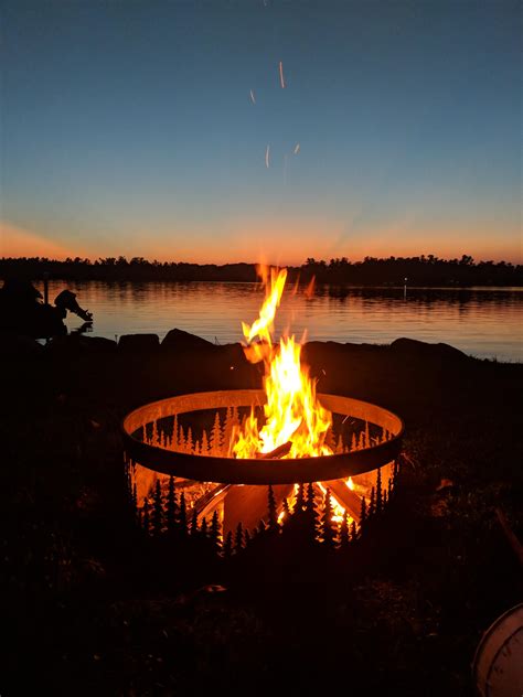 Itap Of A Campfire By A Waterfront Sunset Ritookapicture